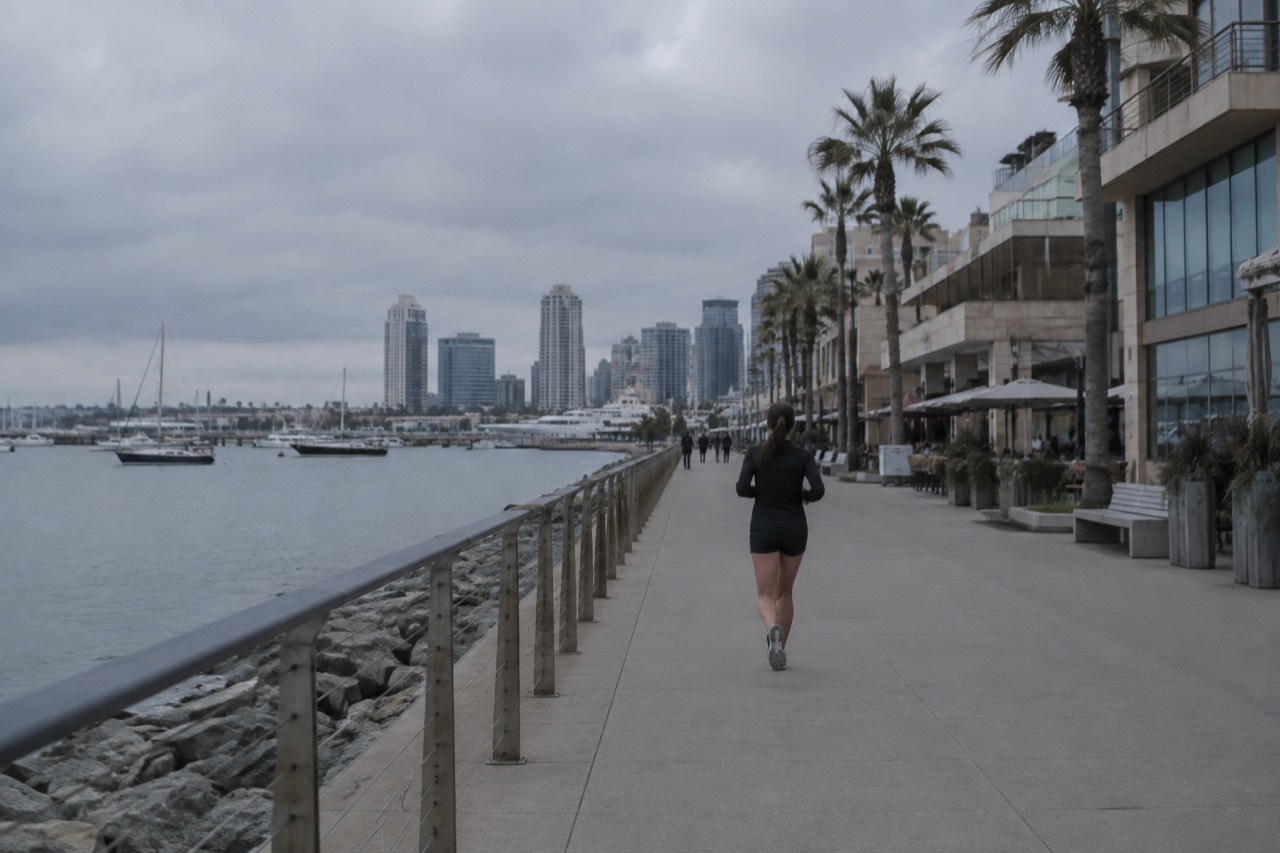 Waterfront shopping promenade with boutiques and bay views in San Diego