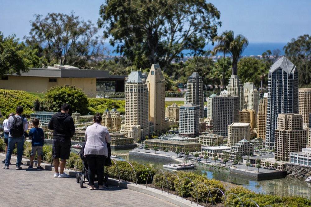 Miniature brick-built city skyline with tiny buildings, roads, and landmarks