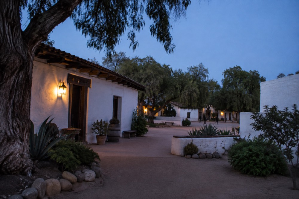 Historic adobe buildings and plaza in Old Town San Diego under clear sky