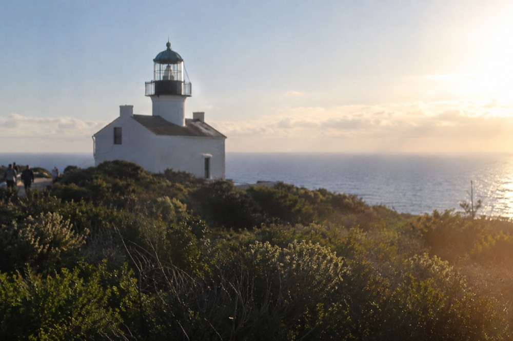 Old Point Loma Lighthouse standing above the Pacific on a clear winter day