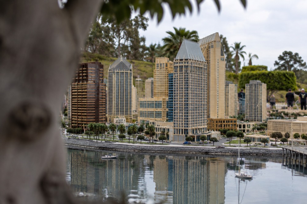 Miniland scale models of buildings made from building bricks in a theme park